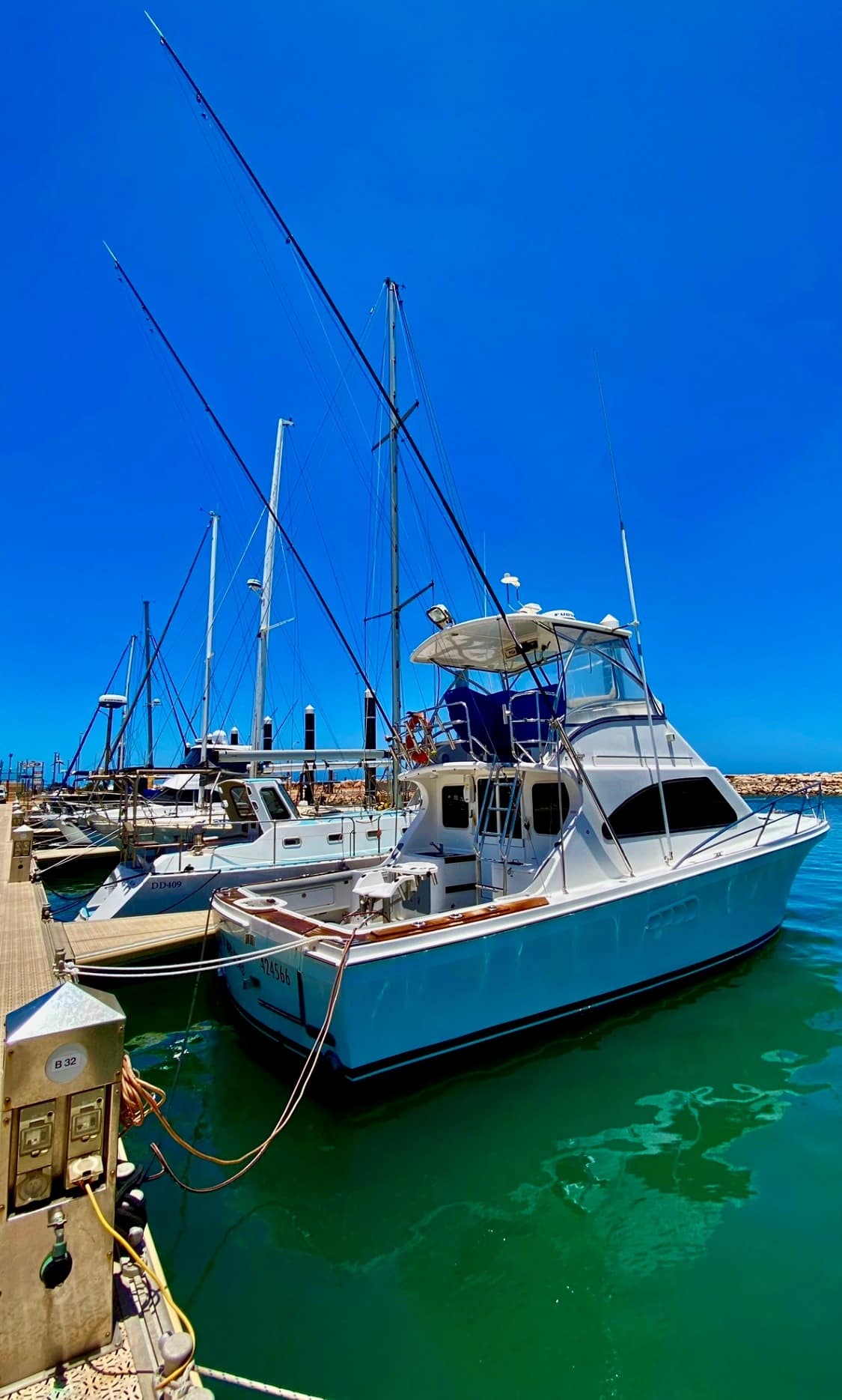 Black N Blue game fishing boat side on photo in Exmouth marina